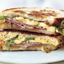 Grilled Ham and Gouda Sandwiches with Frisee and Caramelized Onions