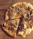 Wild Mushroom Pizza with Caramelized Onions, Fontina, and Rosemary