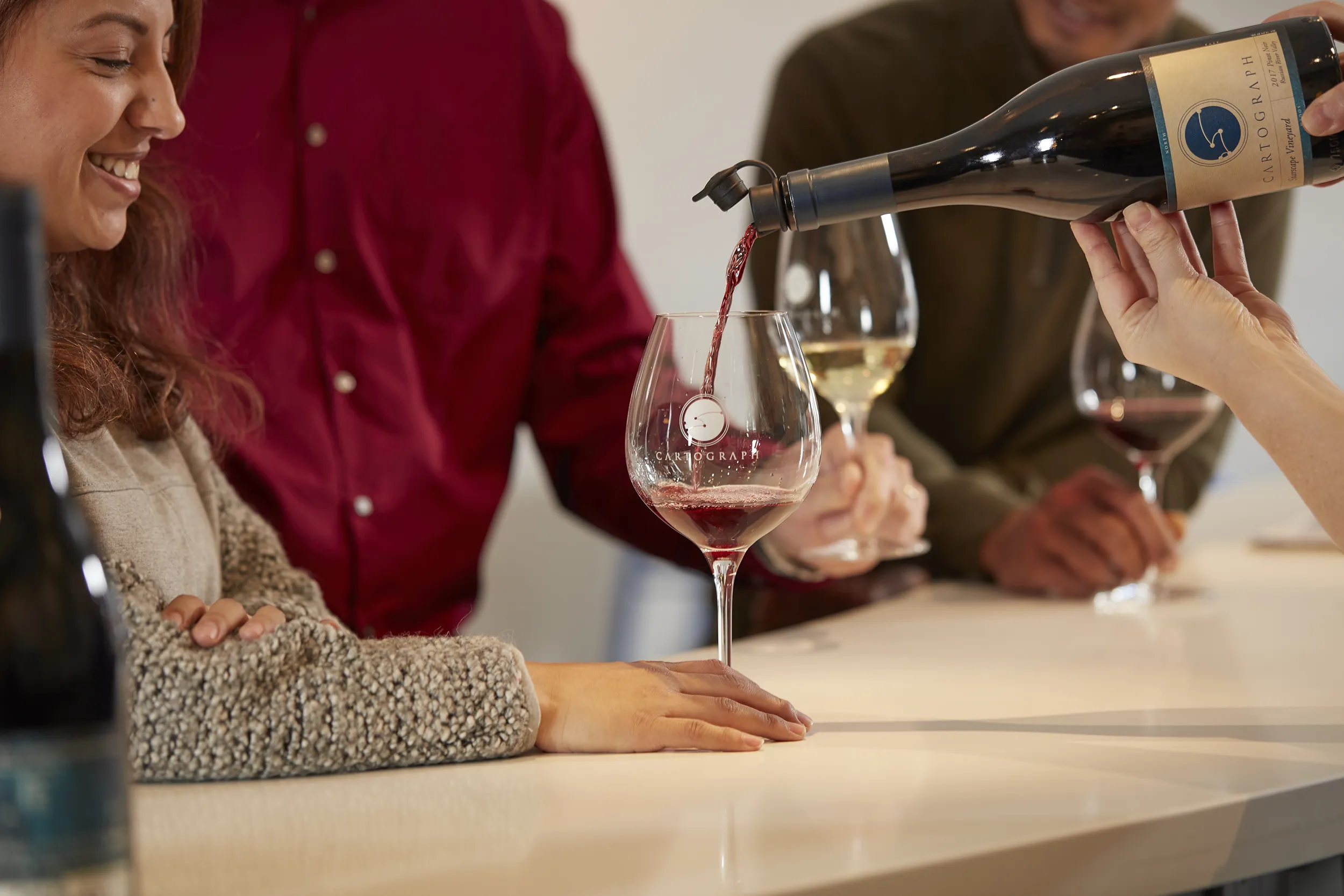 Wine being poured at Cartograph