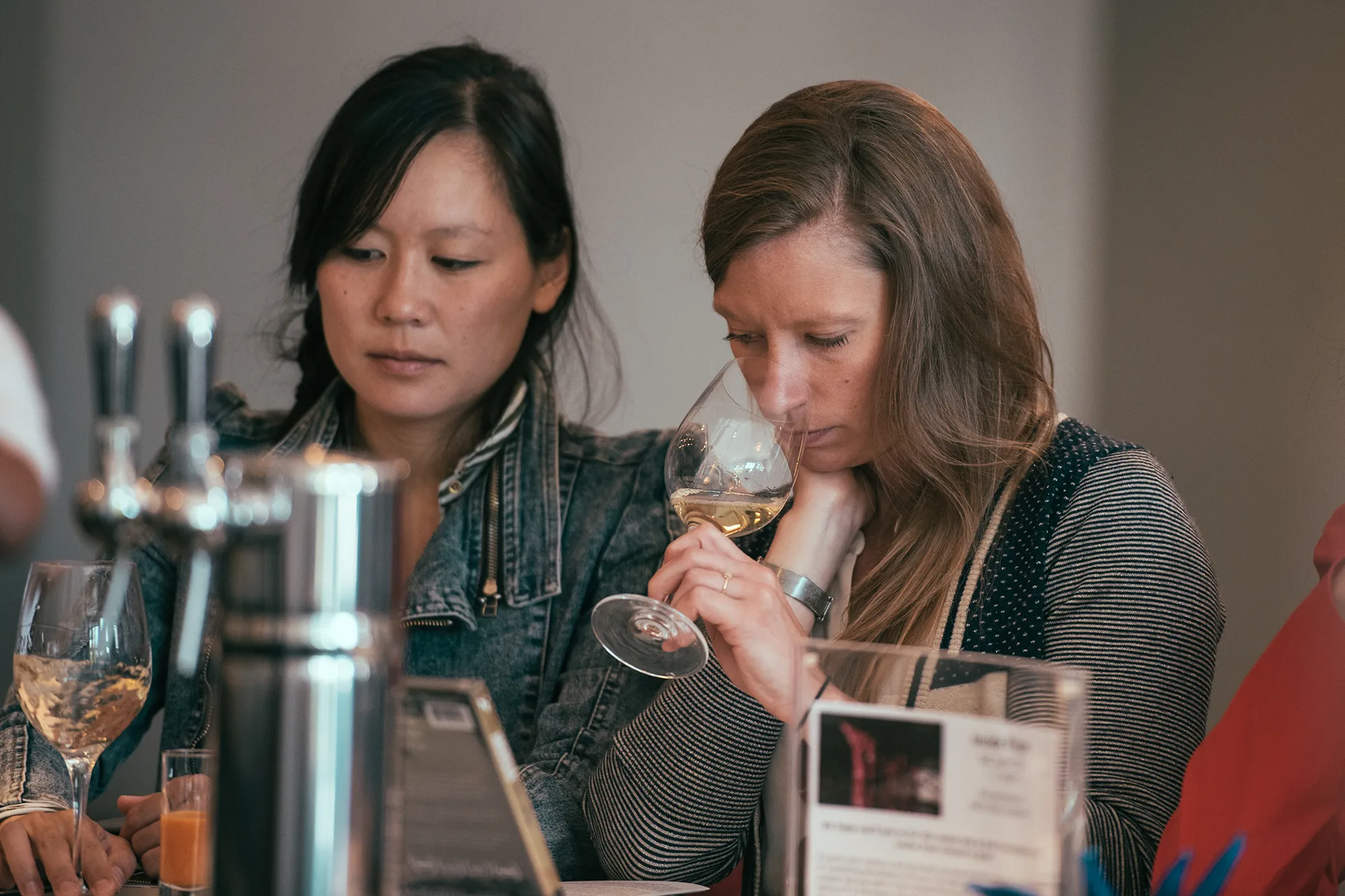 People tasting wine at Cartograph Wines