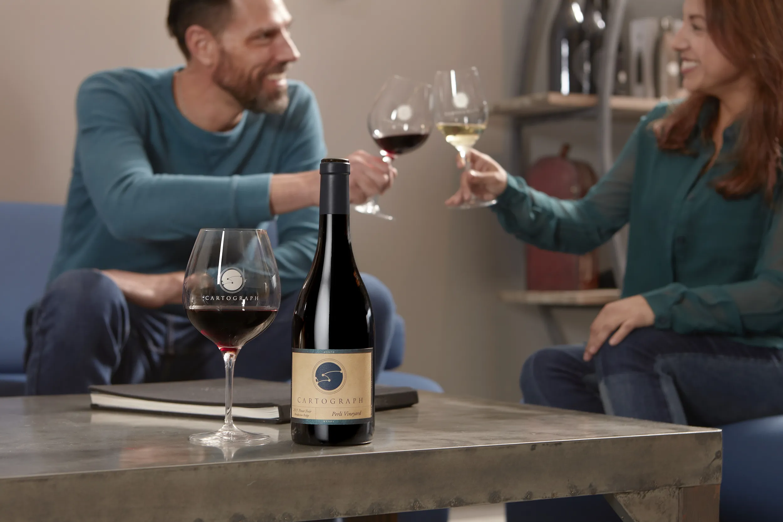 People enjoying wine at Cartograph